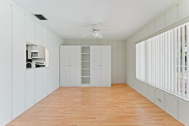Empty room, Interior, Kitchen, Stainless Steel Appliances, Wood Texture Flooring