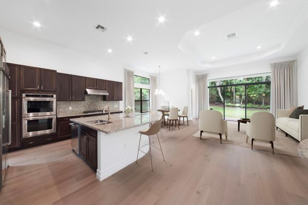 Dining room, Interior, Kitchen, Living room, Pendant Lights, Recessed Lighting, Stainless Steel Appliances, Wood Texture Flooring