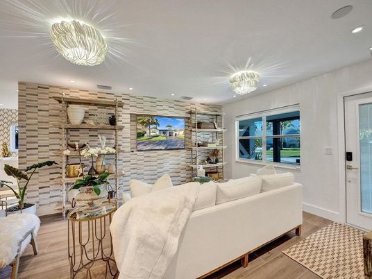 Chandelier, Dining room, Interior, Living room, Recessed Lighting, Stone Walls, Wood Texture Flooring