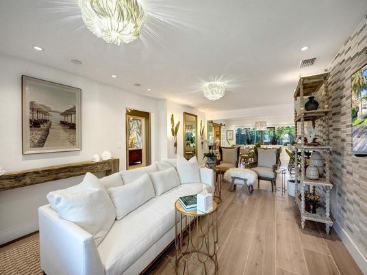 Chandelier, Dining room, Interior, Living room, Recessed Lighting, Stone Walls, Wood Texture Flooring