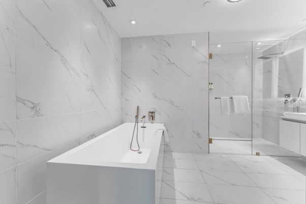 Bathroom, Dual Sink Vanities, Glass Shower, Interior, Marble, Marble Walls, Recessed Lighting