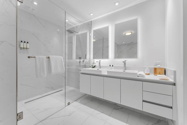 Bathroom, Dual Sink Vanities, Glass Shower, Interior, Marble, Marble Walls, Recessed Lighting