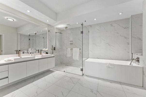 Bathroom, Dual Sink Vanities, Glass Shower, Interior, Marble, Marble Walls, Recessed Lighting