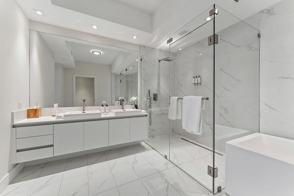 Bathroom, Dual Sink Vanities, Glass Shower, Interior, Marble, Marble Walls, Recessed Lighting