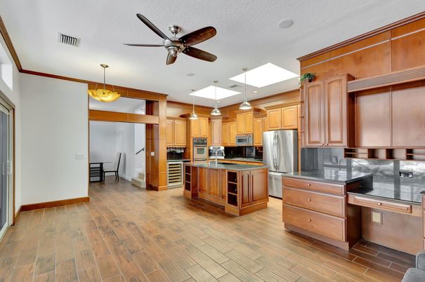 Dining room, Interior, Kitchen, Pendant Lights, Stainless Steel Appliances, Wood Texture Flooring