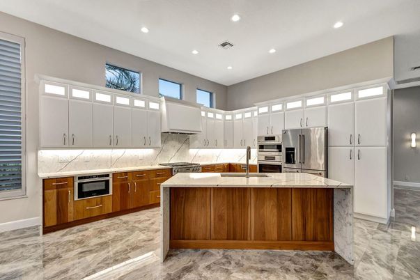 Interior, Kitchen, Marble, Marble Walls, Recessed Lighting, Stainless Steel Appliances