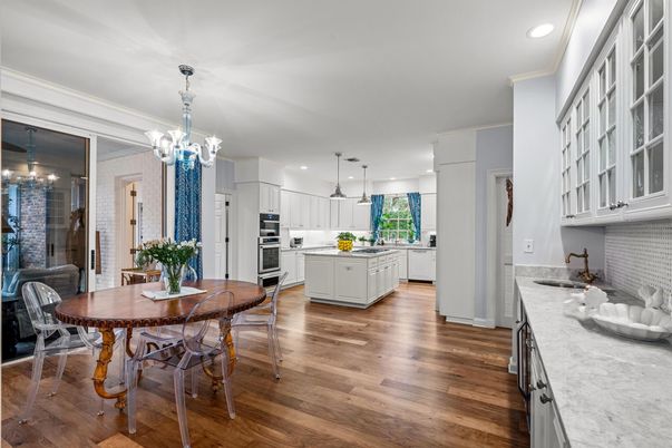 Chandelier, Dining room, Interior, Kitchen, Pendant Lights, Recessed Lighting, Stainless Steel Appliances, Wood Texture Flooring