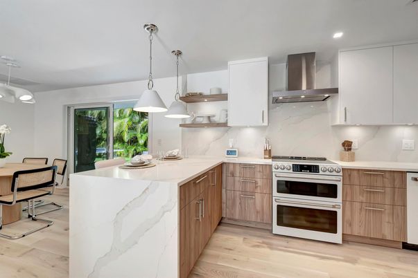 Interior, Kitchen, Marble Walls, Pendant Lights, Recessed Lighting, Stainless Steel Appliances, Wood Texture Flooring
