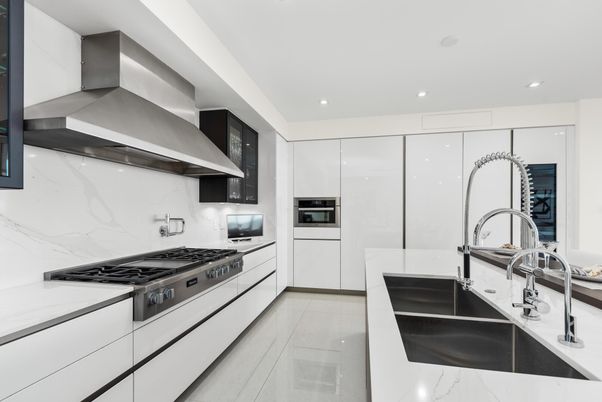 Interior, Kitchen, Marble Walls, Recessed Lighting, Stainless Steel Appliances