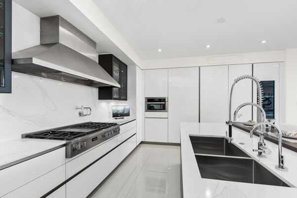 Interior, Kitchen, Marble Walls, Recessed Lighting, Stainless Steel Appliances