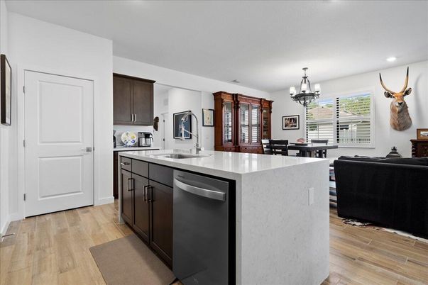 Chandelier, Dining room, Interior, Kitchen, Living room, Recessed Lighting, Wood Texture Flooring