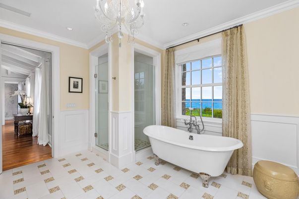 Bathroom, Free Standing Baths, Interior, Recessed Lighting, Water, Wood Texture Flooring