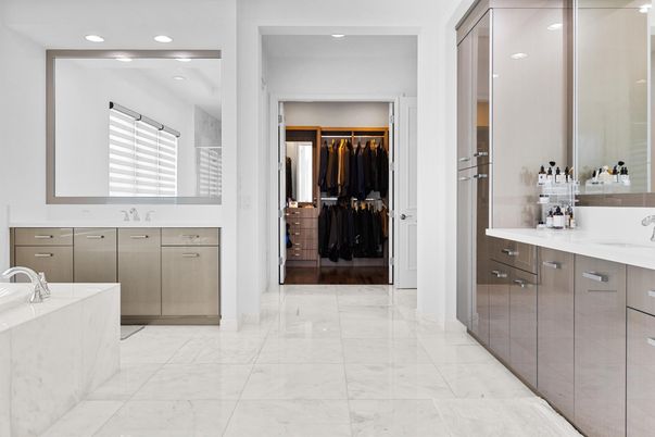 Bathroom, Dual Sink Vanities, Interior, Marble, Recessed Lighting, Walk-in Closets