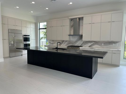 Interior, Kitchen, Marble Walls, Recessed Lighting, Stainless Steel Appliances
