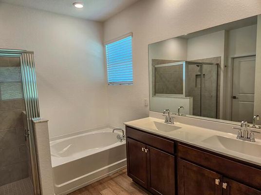 Bathroom, Dual Sink Vanities, Interior, Recessed Lighting, Wood Texture Flooring
