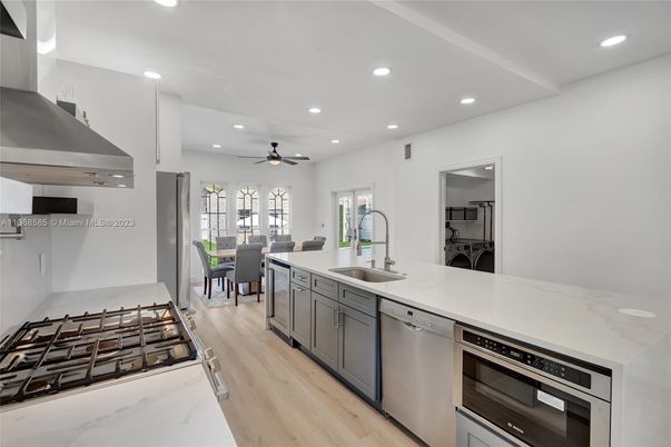 Dining room, Interior, Kitchen, Recessed Lighting, Stainless Steel Appliances, Wood Texture Flooring