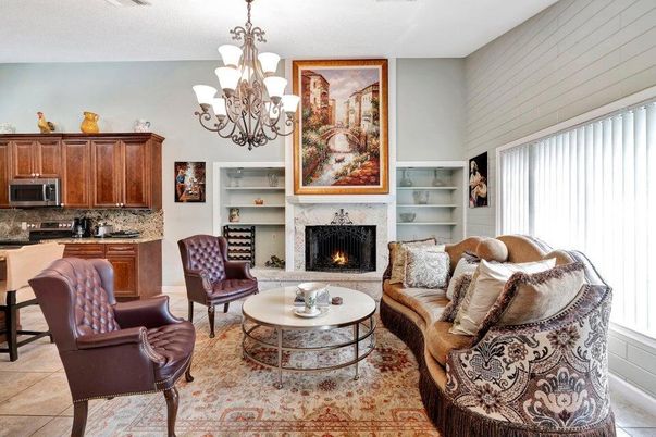 Chandelier, Fireplace, Interior, Living room