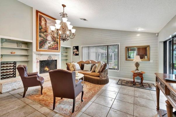 Chandelier, Fireplace, Interior, Living room