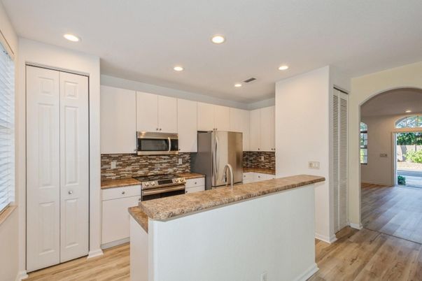 Interior, Kitchen, Recessed Lighting, Stainless Steel Appliances, Wood Texture Flooring