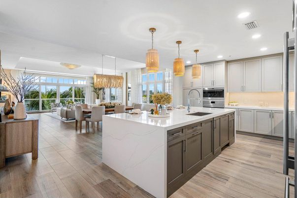 Chandelier, Dining room, Interior, Kitchen, Living room, Pendant Lights, Recessed Lighting, Stainless Steel Appliances, Wood Texture Flooring