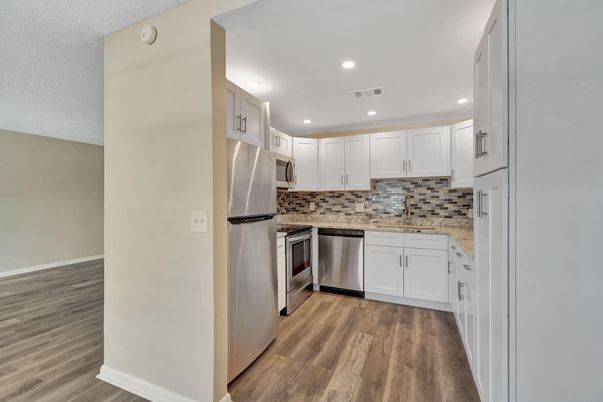 Interior, Kitchen, Recessed Lighting, Stainless Steel Appliances, Wood Texture Flooring
