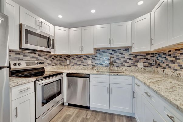 Interior, Kitchen, Recessed Lighting, Stainless Steel Appliances, Wood Texture Flooring