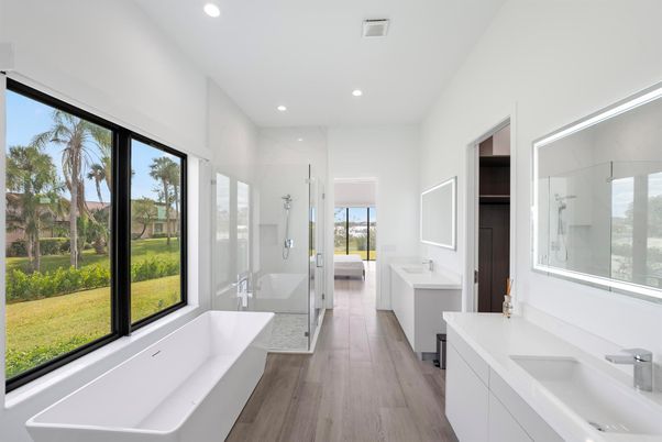 Bathroom, Dual Sink Vanities, Free Standing Baths, Glass Shower, Interior, Recessed Lighting, Wood Texture Flooring