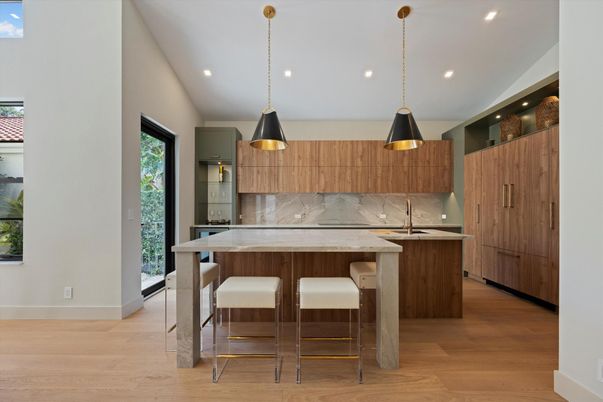 Interior, Kitchen, Marble Walls, Pendant Lights, Recessed Lighting, Stainless Steel Appliances, Wood Texture Flooring