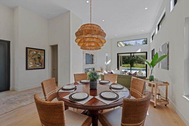 Chandelier, Dining room, Fireplace, Interior, Living room, Recessed Lighting, Wood Texture Flooring