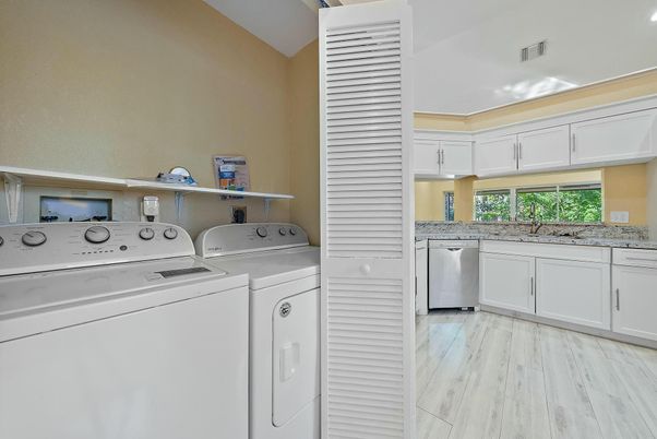 Interior, Recessed Lighting, Utility Closets, Washer, Wood Texture Flooring
