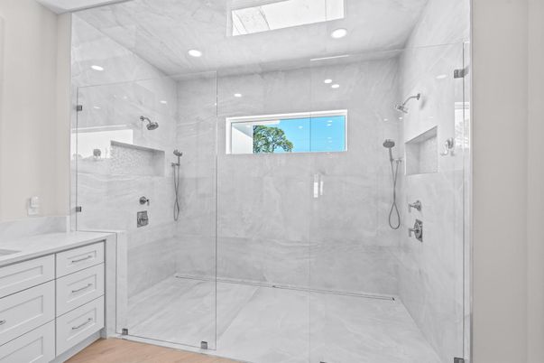 Bathroom, Glass Shower, Interior, Marble Walls, Recessed Lighting, Wood Texture Flooring