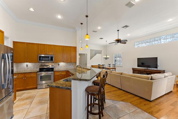 Dining room, Interior, Kitchen, Living room, Pendant Lights, Recessed Lighting, Stainless Steel Appliances, Wood Texture Flooring