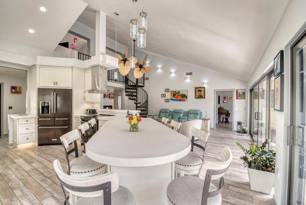 Dining room, Interior, Kitchen, Pendant Lights, Recessed Lighting, Stainless Steel Appliances, Wood Texture Flooring