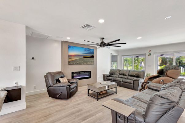 Fireplace, Interior, Living room, Recessed Lighting, Wood Texture Flooring