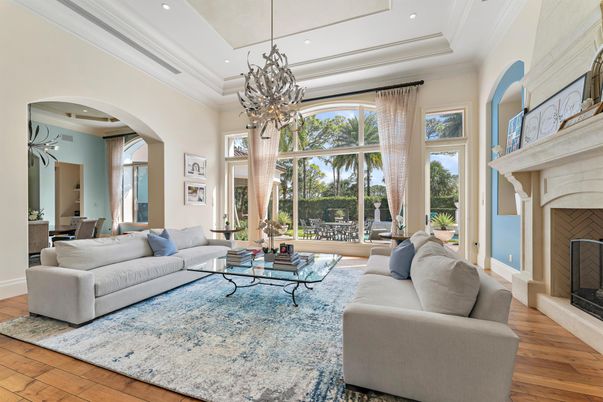 Chandelier, Dining room, Fireplace, Interior, Living room, Pendant Lights, Recessed Lighting, Wood Texture Flooring