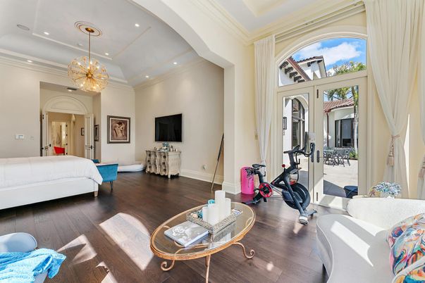 Bedroom, Chandelier, Fitness Equipment, Interior, Recessed Lighting, Wood Texture Flooring
