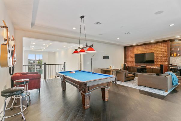 Billiard Table, Game Room, Interior, Living room, Pendant Lights, Recessed Lighting, Stone Walls, Wood Texture Flooring