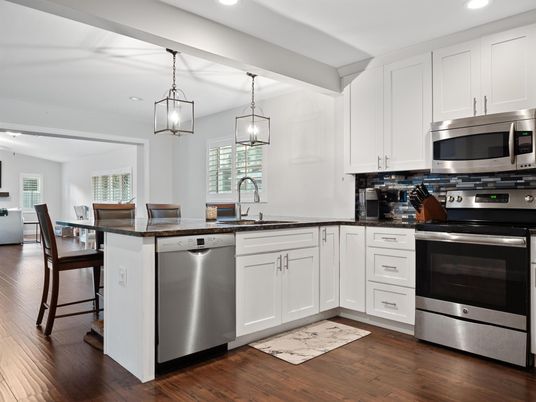 Dining room, Interior, Kitchen, Pendant Lights, Recessed Lighting, Stainless Steel Appliances, Wood Texture Flooring