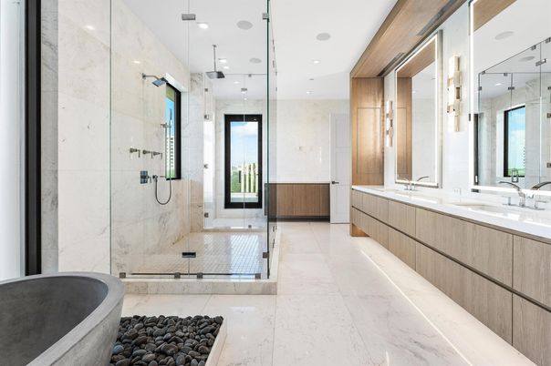 Bathroom, Dual Sink Vanities, Free Standing Baths, Glass Shower, Interior, Marble Walls, Recessed Lighting