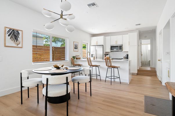 Dining room, Interior, Kitchen, Pendant Lights, Recessed Lighting, Stainless Steel Appliances, Wood Texture Flooring
