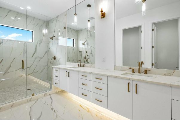Bathroom, Dual Sink Vanities, Glass Shower, Interior, Marble, Marble Walls, Recessed Lighting