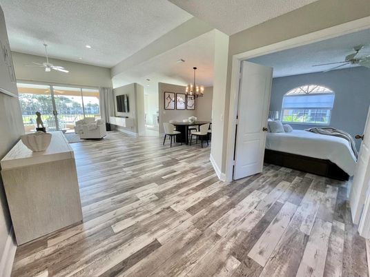 Bedroom, Chandelier, Dining room, Interior, Recessed Lighting, Wood Texture Flooring