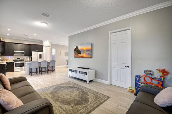 Dining room, Interior, Kitchen, Living room, Recessed Lighting, Stainless Steel Appliances, Wood Texture Flooring