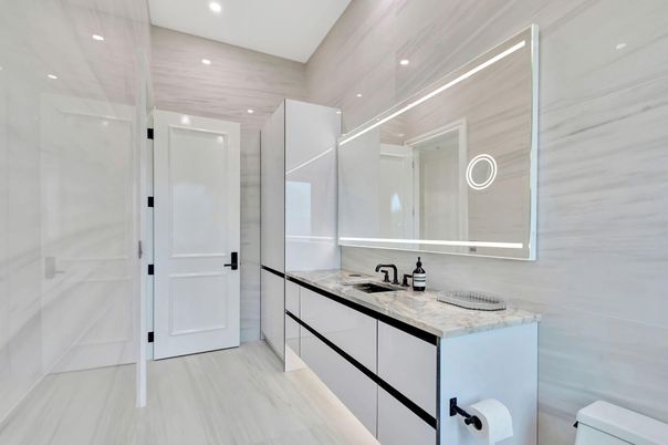 Bathroom, Dual Sink Vanities, Interior, Marble, Marble Walls, Recessed Lighting
