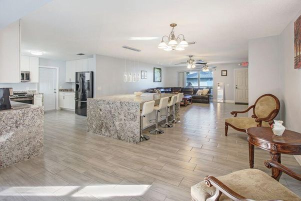 Chandelier, Interior, Kitchen, Living room, Pendant Lights, Stainless Steel Appliances, Wood Texture Flooring