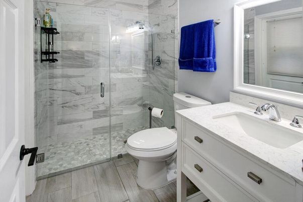 Bathroom, Glass Shower, Interior, Marble Walls, Wood Texture Flooring
