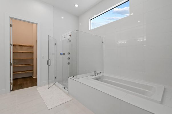 Bathroom, Dual Sink Vanities, Glass Shower, Interior, Recessed Lighting, Wood Texture Flooring