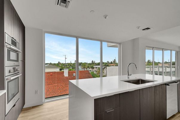 Interior, Kitchen, Recessed Lighting, Stainless Steel Appliances, Water, Wood Texture Flooring