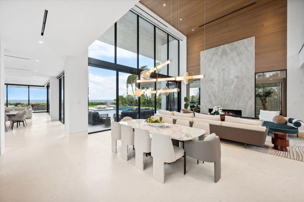Dining room, Fireplace, Interior, Living room, Pendant Lights, Recessed Lighting, Water, Wooden Ceilings
