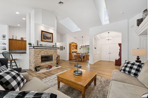 Chandelier, Dining room, Fireplace, Interior, Kitchen, Living room, Pendant Lights, Recessed Lighting, Wood Texture Flooring